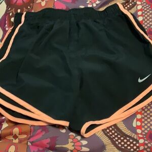 Nike dri-fit running shorts. Black with orange detail. Size small